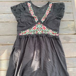 Black mini dress with floral embroidery and lace